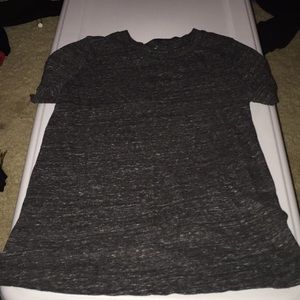 A plain black with white spot shirt